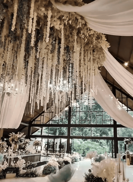 Beautiful drapery wedding decor by Trinity Artwork